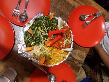 High angle view of red fruits on table