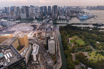 High angle view of river amidst buildings in city