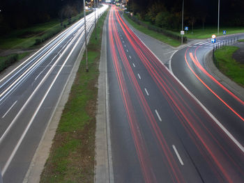 High angle view of light trails on road