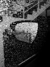 Close-up of wet window in rainy season