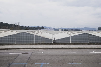 Metal facade of a storage building in an industrial landscape