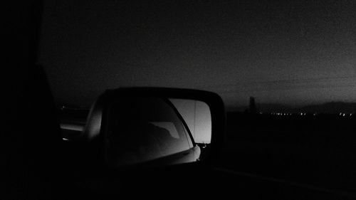 Reflection of cars in parking lot