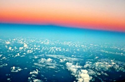 Aerial view of landscape against dramatic sky