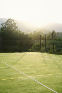 Soccer field against clear sky