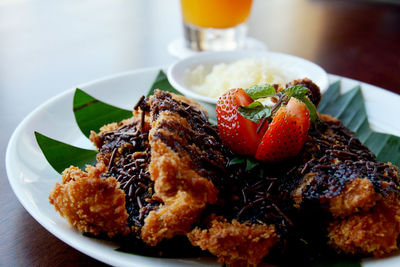 Close-up of food served in plate