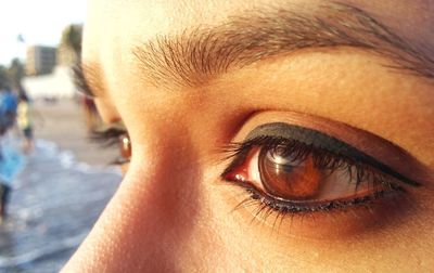 Cropped image of woman eyes looking away