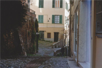 Houses amidst residential buildings