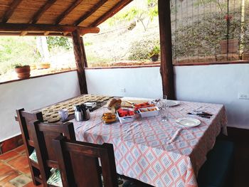 Empty chairs and tables in restaurant