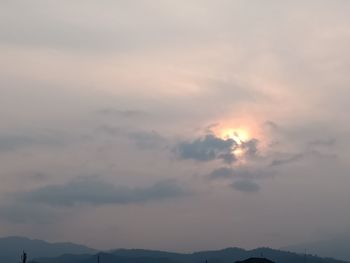 Low angle view of dramatic sky during sunset