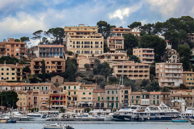 View of buildings in city against sky