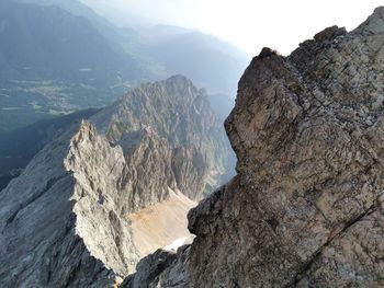 Panoramic view of rocky mountains against sky