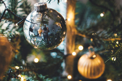 Close-up of christmas decoration hanging on tree