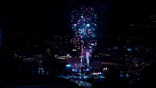 Firework display at night