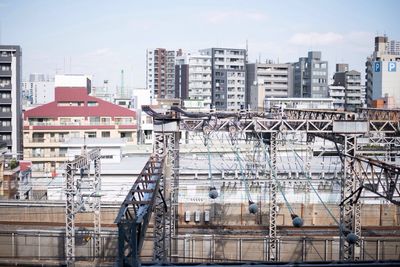 Construction site with buildings in background