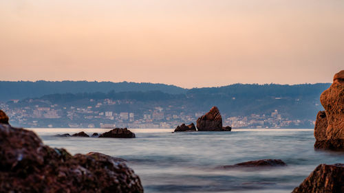 Rock emerging from the sea on front of aguete beach