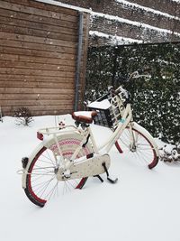 Bicycle on snow covered field