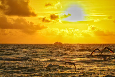 Scenic view of sea against sky during sunset