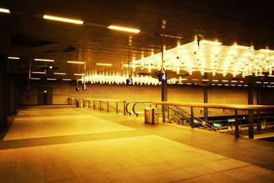 View of illuminated street lights at night