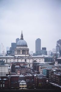 Modern cityscape against sky