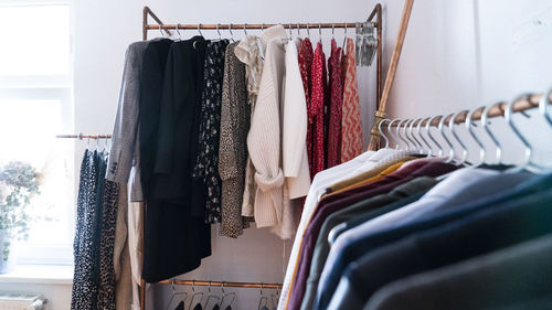Clothes hanging in rack