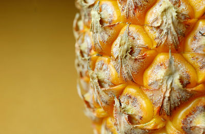 Texture of fresh ripe pineapple's eyes and skin for background and banner