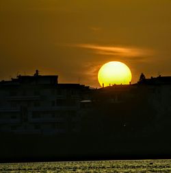 Silhouette of buildings at sunset