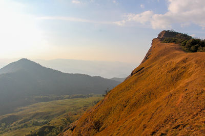 Scenic view of mountains against sky during sunset