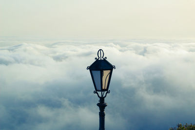 Low angle view of street light against sky