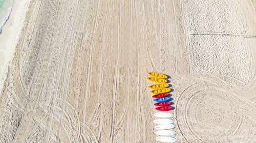 High angle view of multi colored pencils on wood