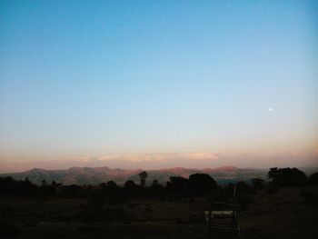 Scenic view of landscape at sunset