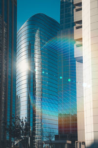 Low angle view of modern buildings against sky