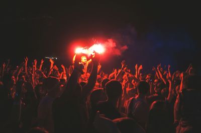 People enjoying at concert