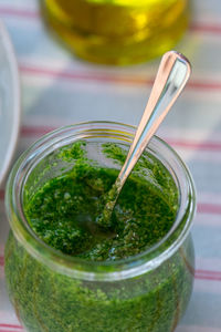 Close-up of drink in glass jar on table