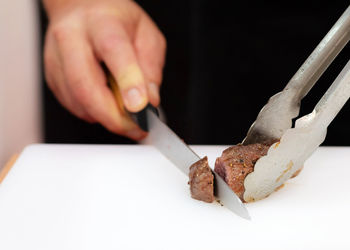 Close-up of person preparing food