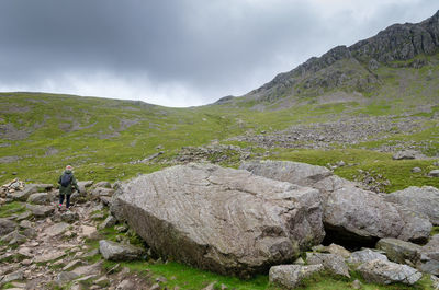 Climbing scafell pike which is the tallest mountain in england