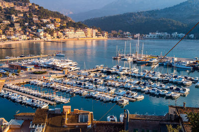 High angle view of boats moored in harbor