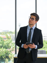 Young man using mobile phone