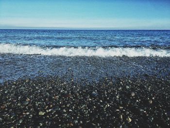 Scenic view of sea against clear sky