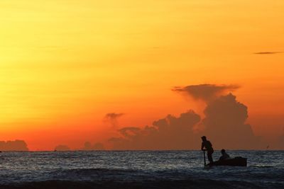 Scenic view of sea at sunset