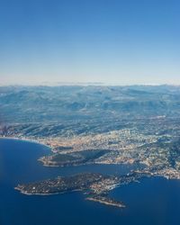 Aerial view of sea against clear sky