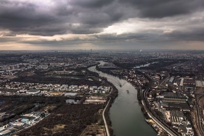 Aerial view of cityscape against sky during sunset