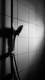 Close-up of faucet in bathroom