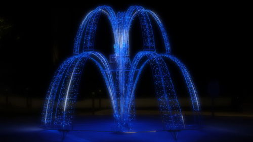 Close-up of illuminated light trails at night