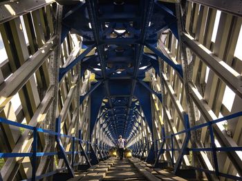 Bridge in illuminated building