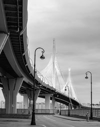 View of bridge against cloudy sky