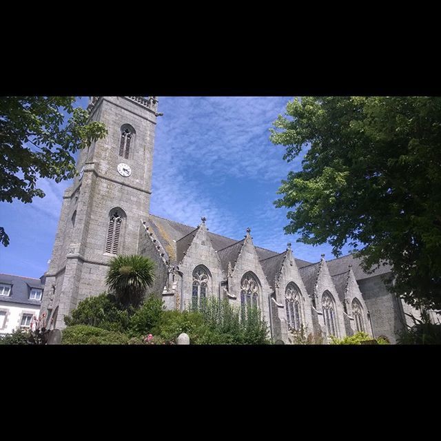 architecture, built structure, building exterior, tree, low angle view, place of worship, religion, church, arch, transfer print, sky, spirituality, history, facade, cathedral, auto post production filter, window, day