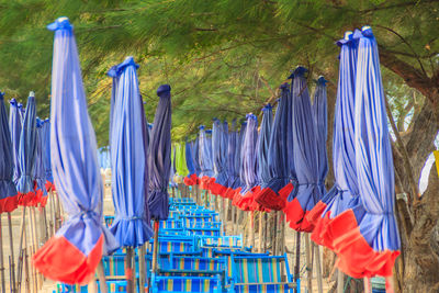 Multi colored flags hanging on clothesline