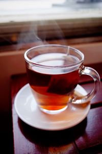 Close-up of coffee served on table