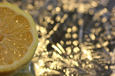 Close-up of lemon against defocused lights