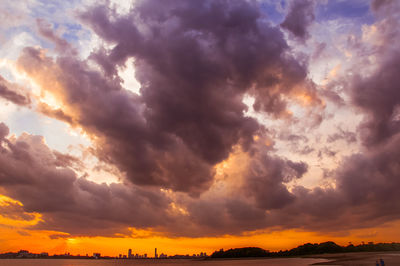 Scenic view of dramatic sky during sunset